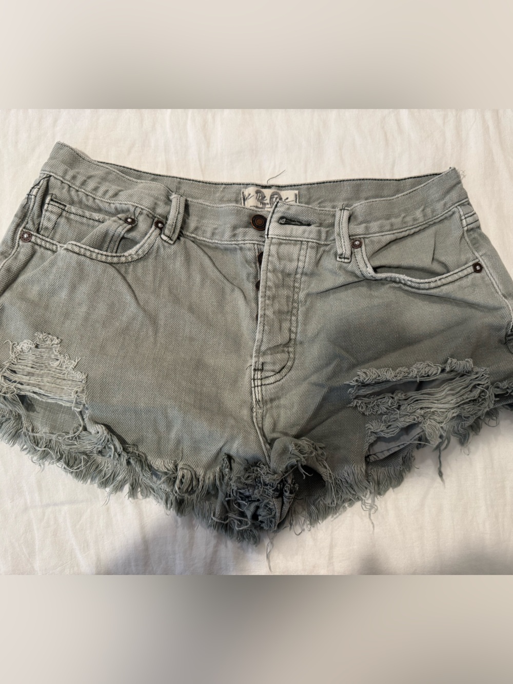 Free People We the Free Distressed Green Denim Cutoff Shorts - SIZE 30